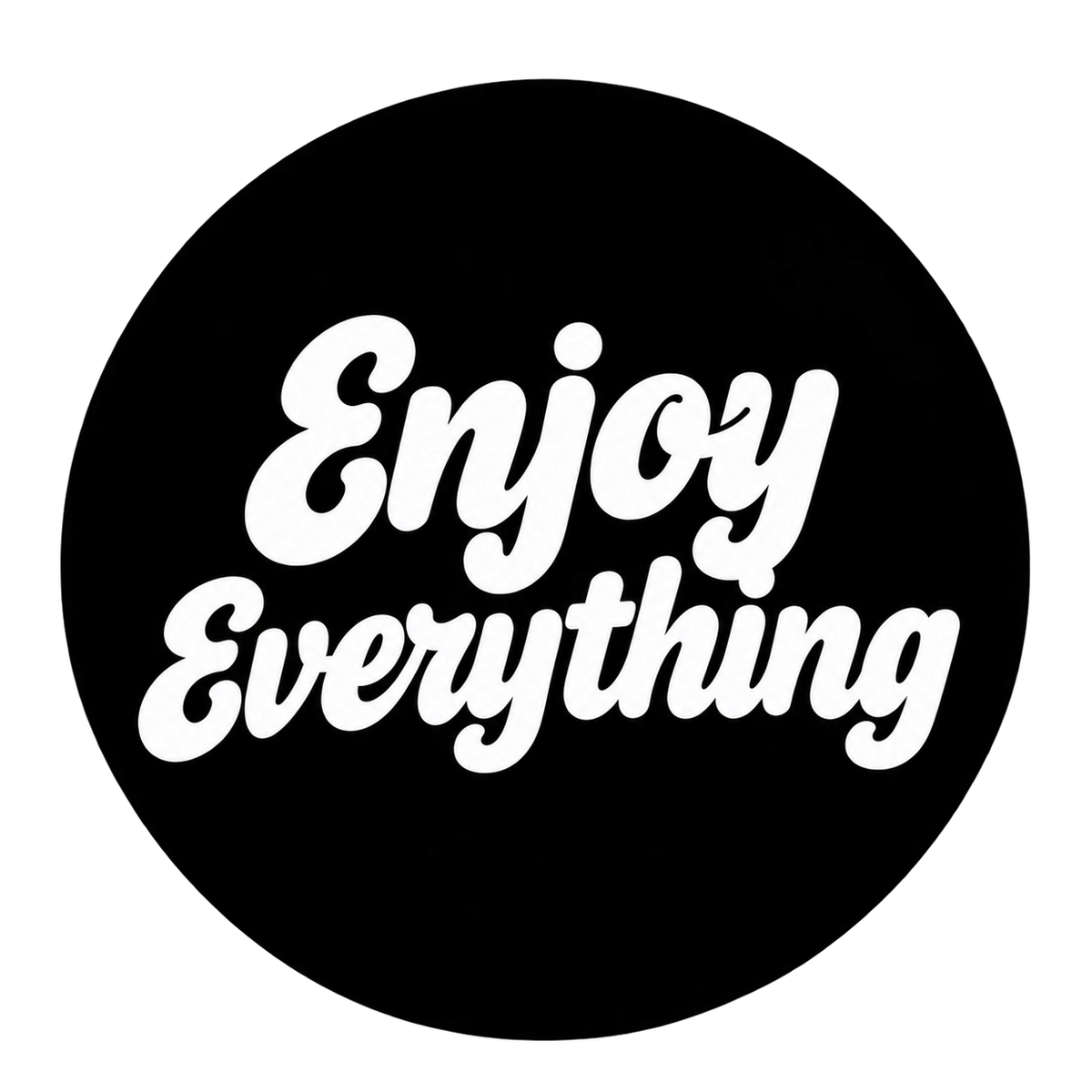 Enjoy Everything original white script inside a black circular badge